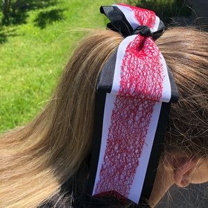 Black, white, and red hair bow